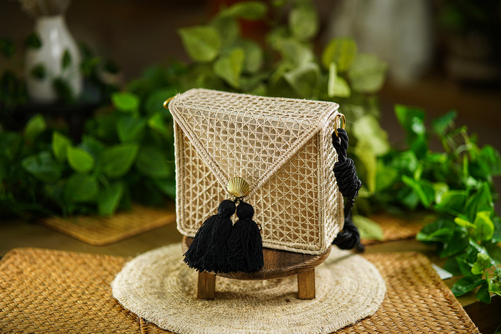 Square Woven Bag with Black Tassels and Golden Shell Detail