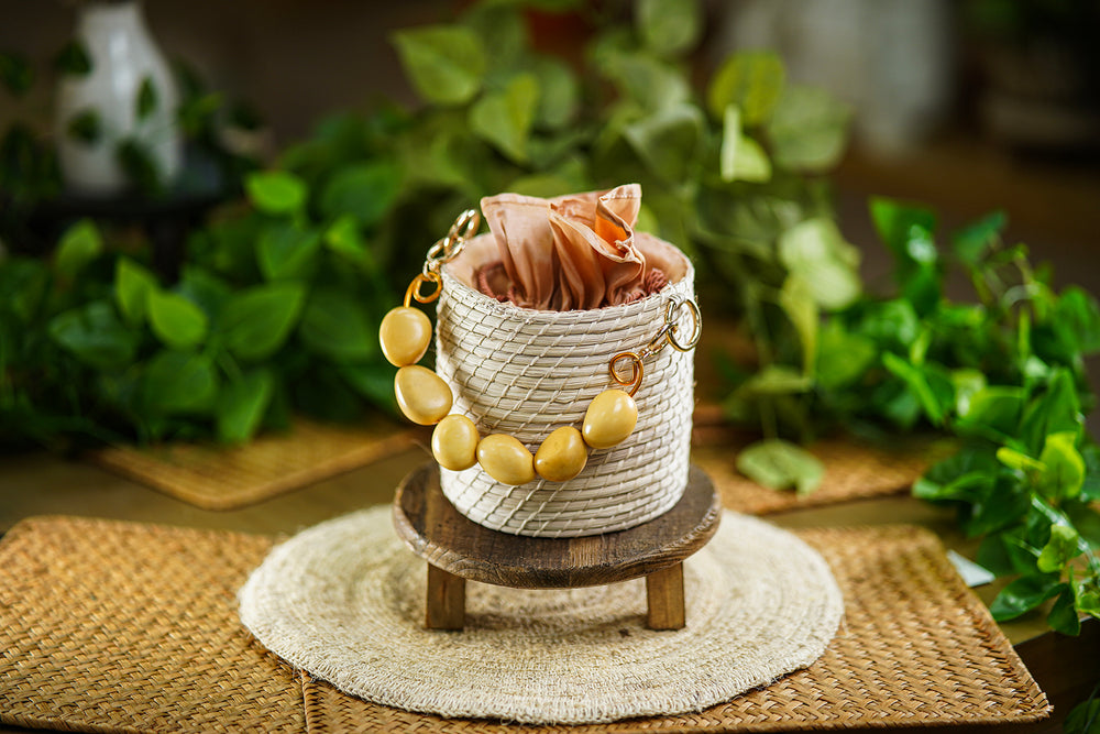 Cylindrical Woven Bag with Golden Bead Handle